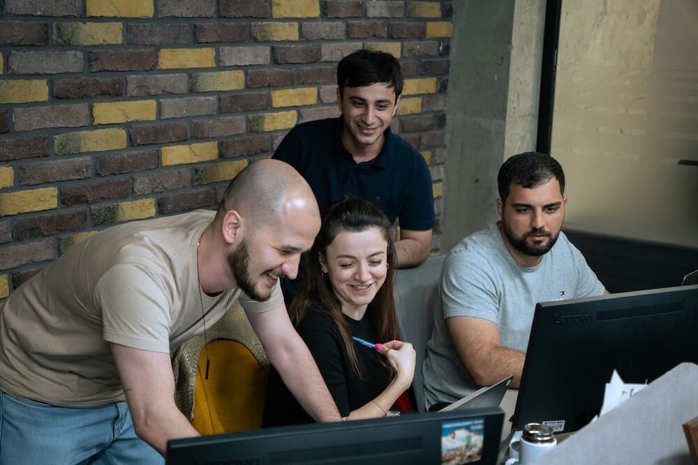 CRM consulting team reviewing business automation and workflow requirements